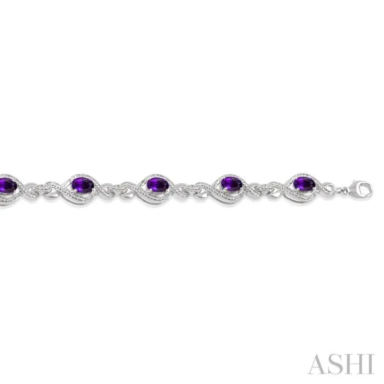 1/10 Ctw Round Cut Diamond & 7x5MM Oval Cut Amethyst Semi Precious Bracelet in Sterling Silver