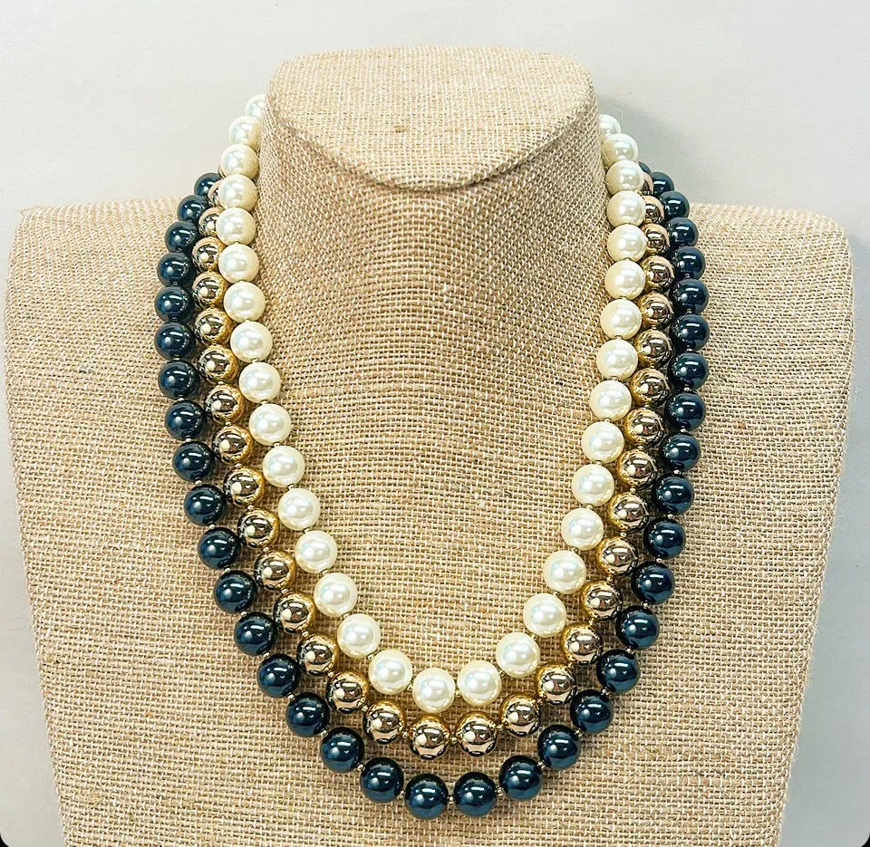 Fabric faux pearl necklace cluster set by Charter Club.