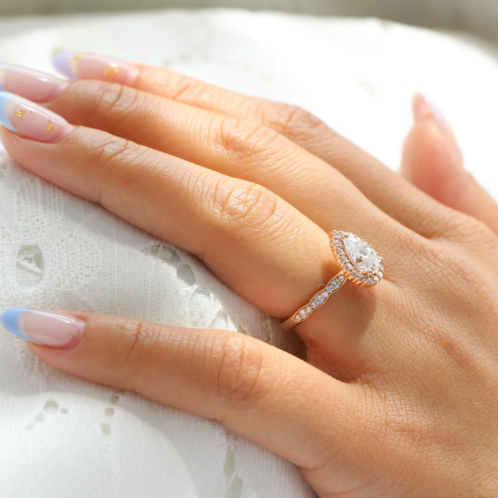 Pear Moissanite Engagement Ring in Luna Halo Diamond Scalloped Band